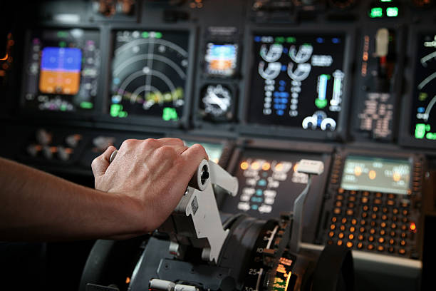 Jet Cockpit 737 NG Throttle Flight simulator with pilot hand in throttle cockpit stock pictures, royalty-free photos & images