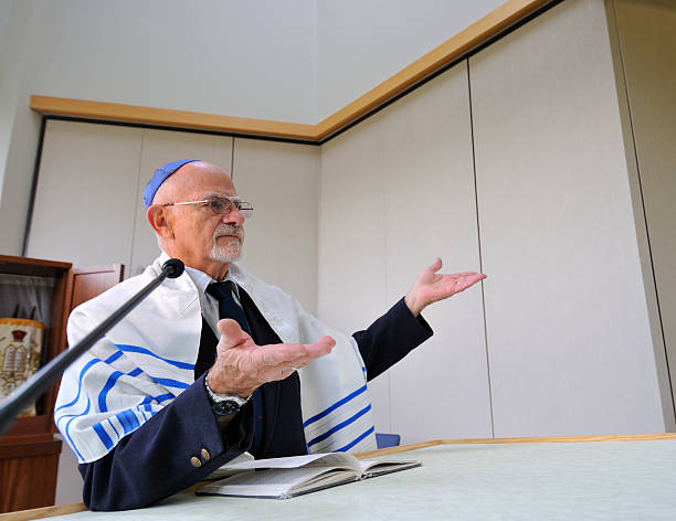 Jewish Rabbi Says 'Please Rise' stock photo