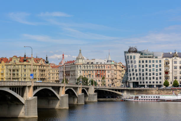 Jiraskow Bridge leading to the Dancing House in Prague, Czech Republic stock photo