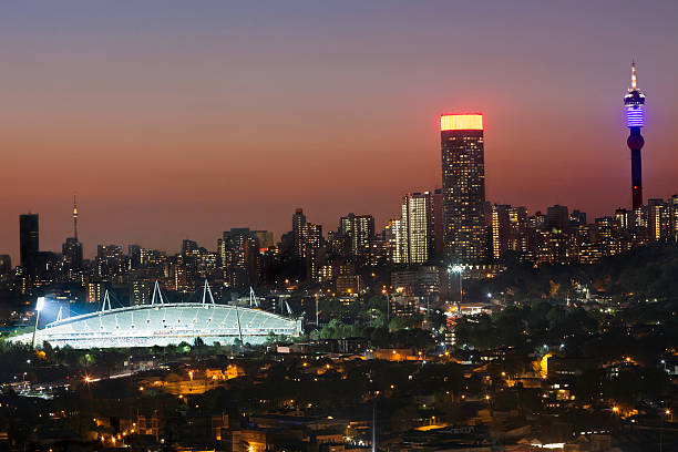 Johannesburg City and Stadium in the evening stock photo