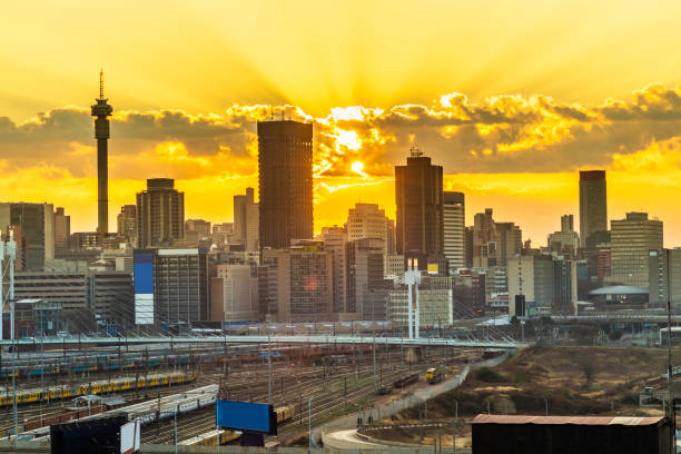 Johannesburg sunrise cityscape silhouette stock photo