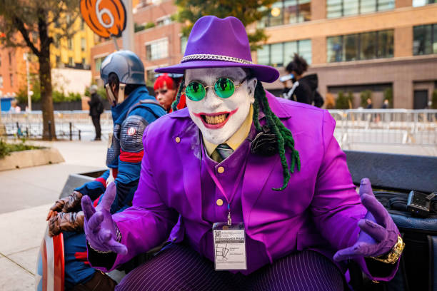 Joker clown costume at NYC Village Halloween parade stock photo
