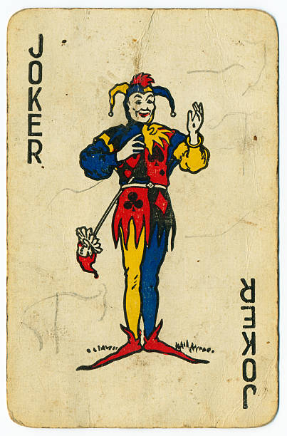 Joker old playing card from 1940s Joker playing card. This old and well-used joker playing card is from a pack manufactured by John Waddington Ltd. for Miles Aircraft Ltd., Reading, England, in the 1940s. The back of the card is purple, displaying a Miles Marathon aircraft in flight. Miles was the name used to market the aircraft of British engineer Frederick George Miles. His company used the name Miles Aircraft Limited from 1943, but the company was declared bankrupt in 1947. jester stock pictures, royalty-free photos & images