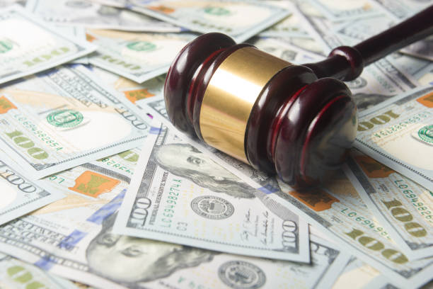 Judges Or Auctioneer Gavel On The Dollar Cash Background, Top View, Close-Up. Concept For Corruption, Bankruptcy, Bail, Crime, Bribing, Fraud, Auction Bidding, Fines stock photo