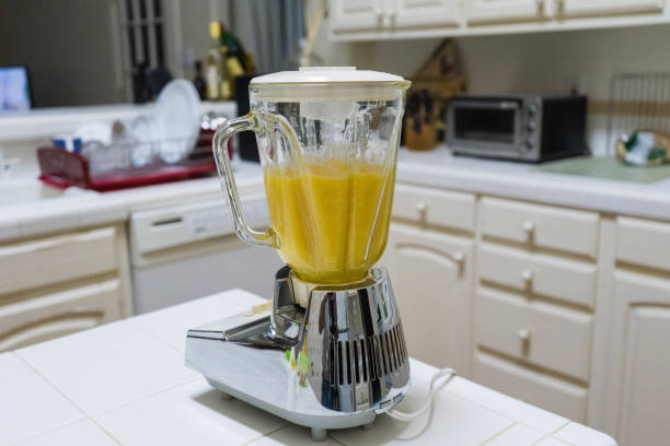 Juice Blender on Kitchen Counter Make Juice stock photo