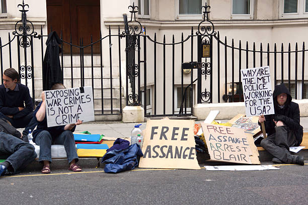 Julian Assange Protesters in London stock photo