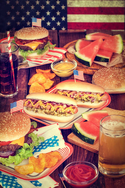 July 4th or Memorial Day - Picnic Table with Food stock photo