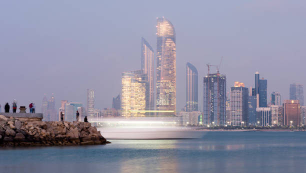 Jumeirah At Etihad Towers Abu Dhabi evening skyline stock photo