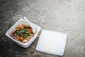 istock Junk food, fried rice, fried Pork with Basil in plastic box. 664194638