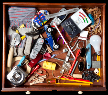 Drawer with many miscellaneous objects.