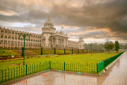 Just after the rain with a cloudy sky at Vidhana Soudha (State Legislature Building) in Bangalore, Karnataka, India.