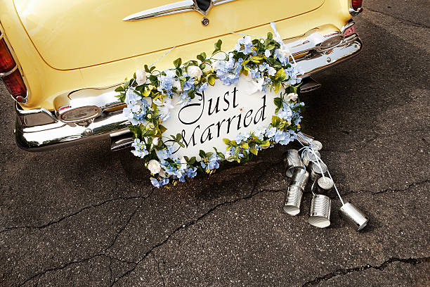 just married Bumper of limousine with just married sign and cans attached newlywed stock pictures, royalty-free photos & images