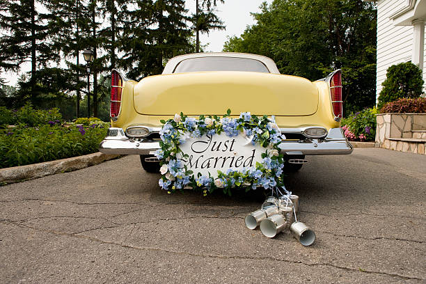 Just Married Bumper of limousine with just married sign and cans attached newlywed stock pictures, royalty-free photos & images