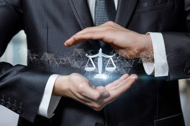 Justice protection concept. Justice protection concept. Hands protect by gesture the scales of justice icon. law stock pictures, royalty-free photos & images