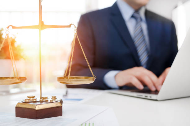 Justice symbol weight scales on table Justice symbol weight scales on table. Attorney working in office. Law attorney court judge justice legal legislation concept Legal stock pictures, royalty-free photos & images