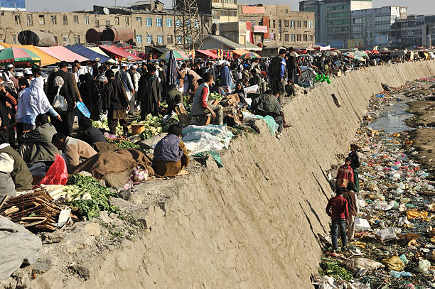 Kabul's bazaar / market along heavily polluted Kabul river stock photo