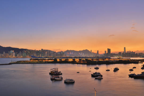 kai tak cruise with HK Victoria Harbour stock photo