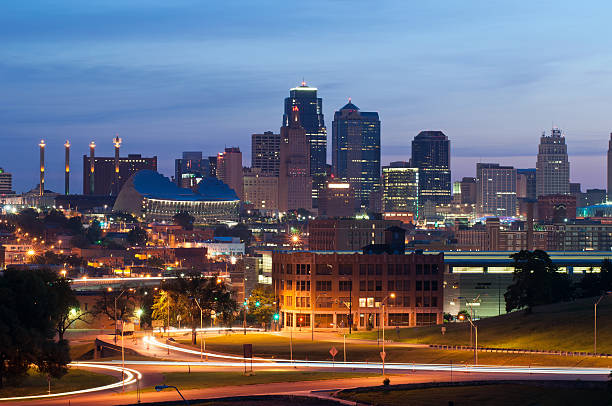Kansas city at night in motion Image of the Kansas City skyline at sunrise. kansas city missouri stock pictures, royalty-free photos & images