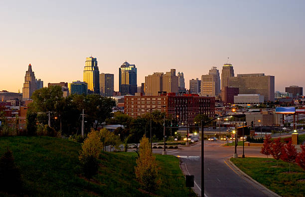 Kansas City skyline at dusk View of the Kansas City downtown skyline at dusk. kansas city kansas stock pictures, royalty-free photos & images
