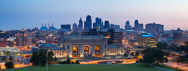 Kansas City skyline panorama. Panoramic image of the Kansas City downtown district at sunrise. This is composite of two horizontal images stitched together in photoshop. kansas city missouri stock pictures, royalty-free photos & images