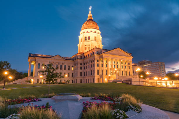 Kansas State Capital Building at Night Exterior of the Kansas State Capital Building in Topeka, Kansas at Night topeka stock pictures, royalty-free photos & images