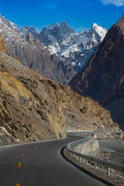 Karakoram Highway with mountain in background stock photo