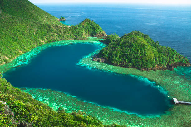 Karawapop, a heart-shaped lagoon in the cluster of West Papua island, Raja Ampat Indonesia stock photo