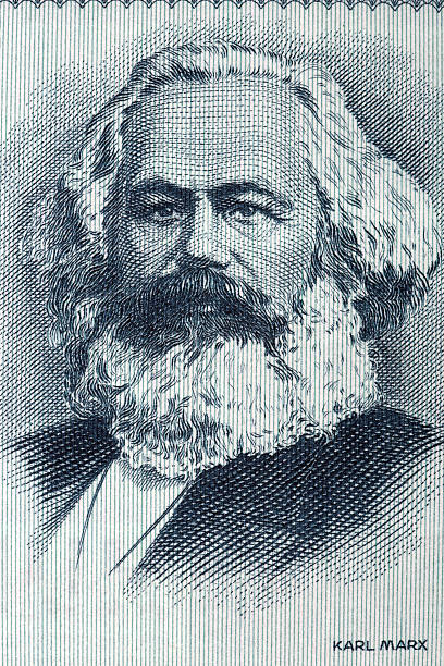 Karl Marx portrait from old German money stock photo
