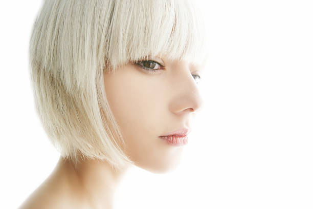 Karma dreams A young woman with a modern hairstyle. white hair young woman stock pictures, royalty-free photos & images