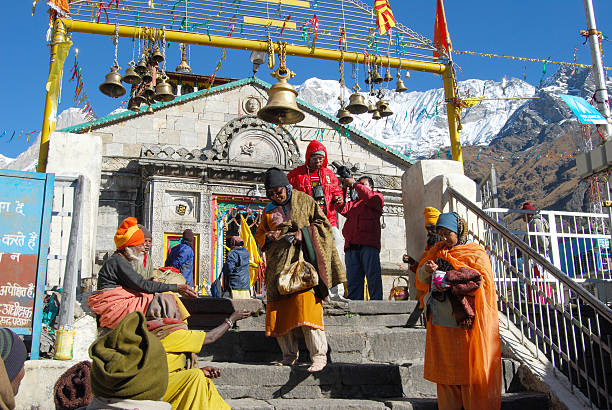 Kedarnath Temple Uttarakhand, India.- October 27, 2010: Kedarnath Temple is one of the holiest Hindu temples dedicated to the god Shiva ,and is located on the Garhwal Himalayan range  ,pilgrims in front of the temple kedarnath temple stock pictures, royalty-free photos & images