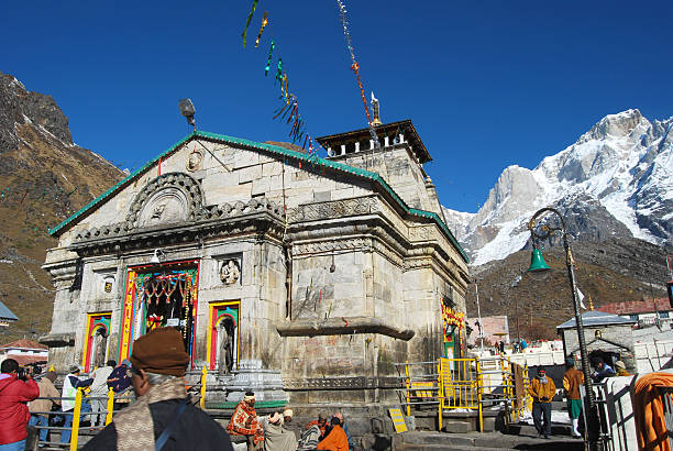 Kedarnath Temple Uttarakhand, India.- October 27, 2010: Kedarnath Temple is one of the holiest Hindu temples dedicated to the god Shiva ,and is located on the Garhwal Himalayan range  ,pilgrims in front of the temple kedarnath temple stock pictures, royalty-free photos & images