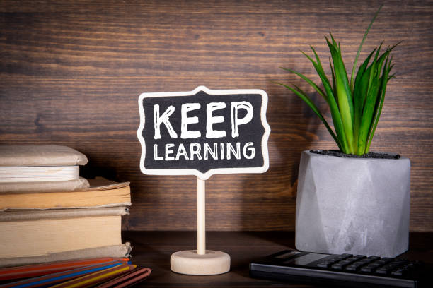 Keep Learning. Education, Courses, Online Training and Languages Concept Keep Learning. Education, Courses, Online Training and Languages Concept. Chalkboard on the desk continuity stock pictures, royalty-free photos & images