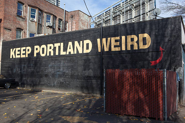 Keep Portland Weird sign painted on a building stock photo