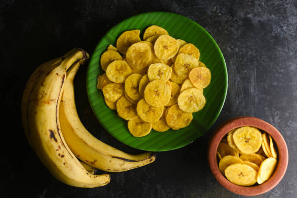 keripik pisang kerala - keripik pisang potret stok, foto, & gambar bebas royalti