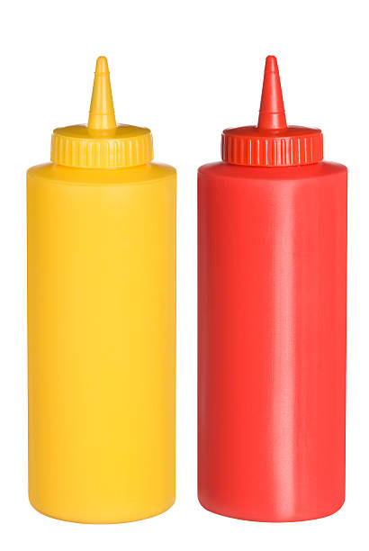 Ketchup and mustard squeeze bottles stock photo