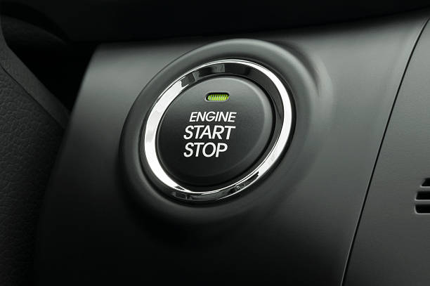 Keyless Smart Key Engine Start Stop Button Keyless smart key engine start/stop button on a modern vehicle. ignition stock pictures, royalty-free photos & images