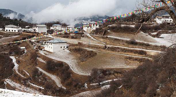 Khampa Tibetan Village and Farmland in High Mountain stock photo