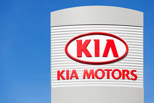 Kia Motors Sign Above Dealership stock photo