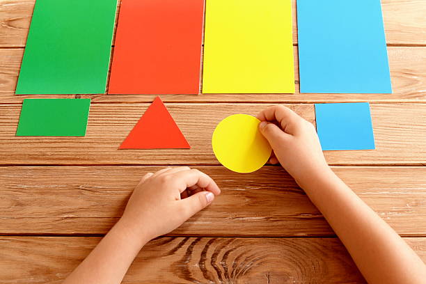 Kid learns colors stock photo