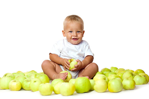 kid with apples stock photo
