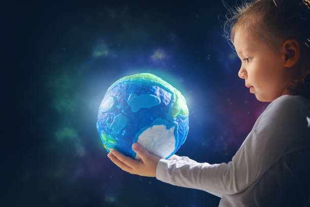 Kid with globe. Child with globe. Happy Earth day. children day stock pictures, royalty-free photos & images