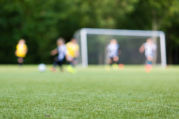 Kids soccer blur stock photo