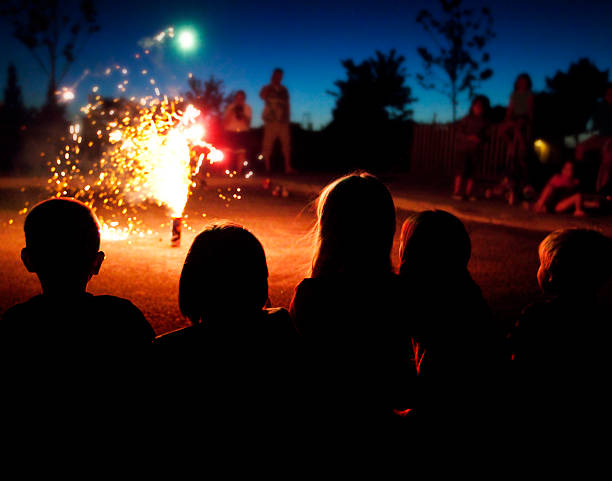 Kids Watching Fireworks: Fourth of July stock photo