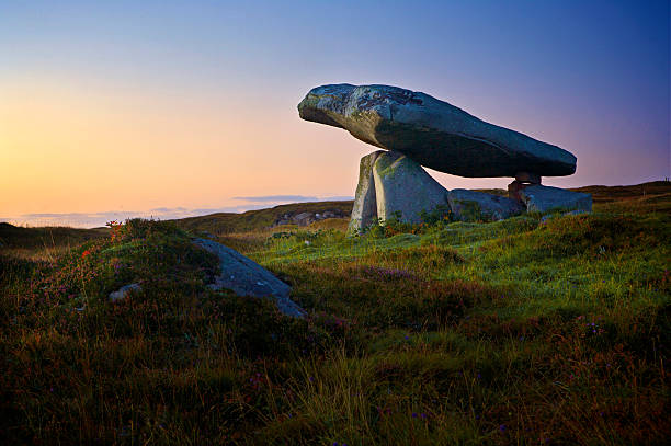 Kilclooney Dolmen, Ardara, Ireland A sunrise shot of the Kilclooney Dolmen near Ardara in Ireland. county donegal stock pictures, royalty-free photos & images