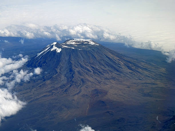 Kilimanjaro Crater The crater of the highest mountain in Africa photographed from the cockpit of an airplane. mt kilimanjaro photos stock pictures, royalty-free photos & images