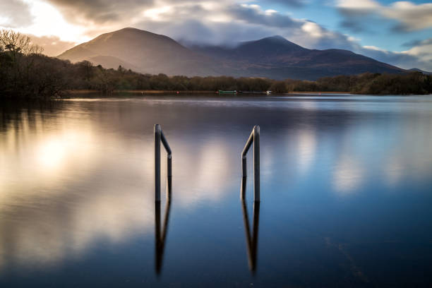Killarney National Park Sunset at Lough Leane in Killarney National Park county kerry stock pictures, royalty-free photos & images