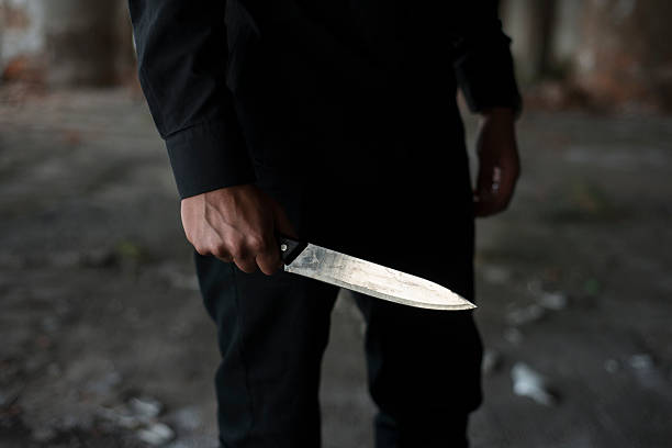 killer man holding knife in his hand murder stock pictures, royalty-free photos & images