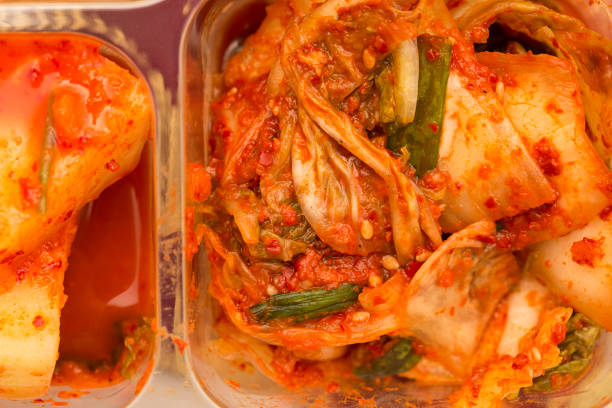 Kimchi is Korean fermented cabbage and it's an integral ingredient in Korean cuisine. stock photo