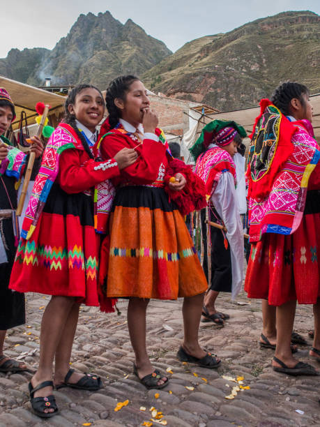 Kinds in folk costume Pisac, Peru - May 19, 2016: Kids in colorful, folk costumes in the Pisac market. Latin America.Pisac, Peru - May 19, 2016: Kids in colorful, folk costumes in the Pisac market peru girl stock pictures, royalty-free photos & images