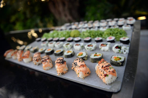Kinds of sushi on a gray tray. stock photo